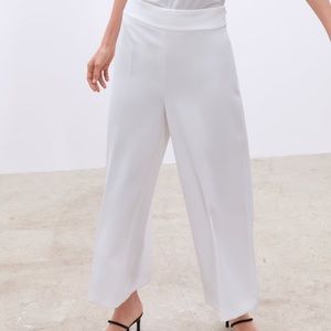 White high-waisted pants